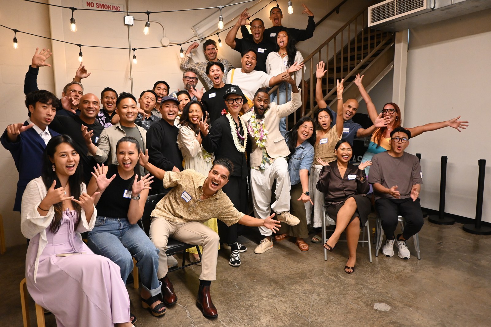 The same group, arms up