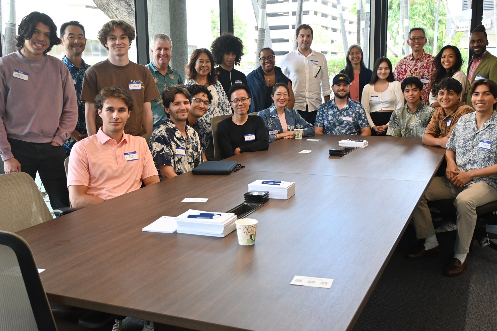 Group portrait around the boardroom table after the Gen Z panel