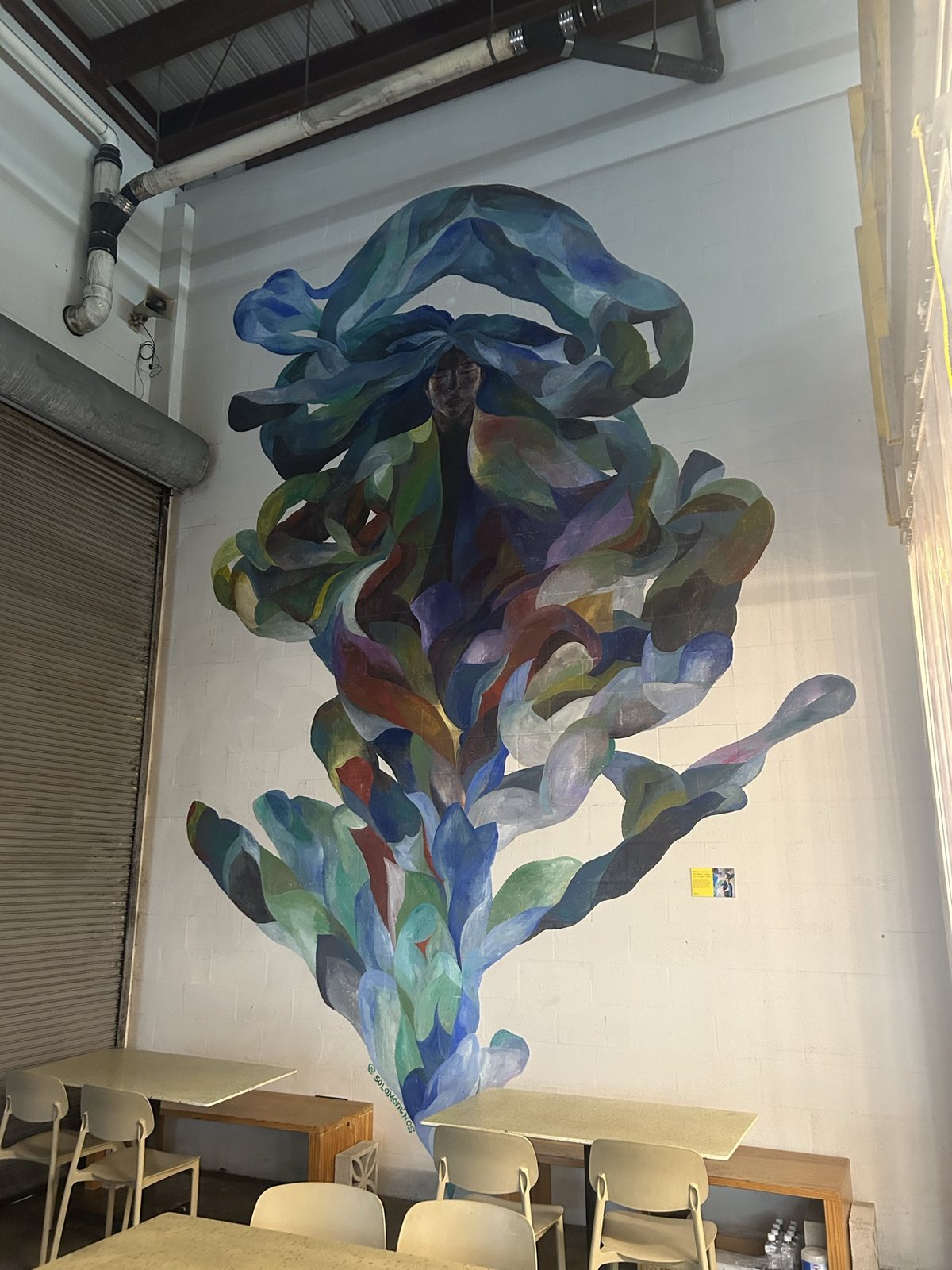 A wall-sized mural in the OurSpace room