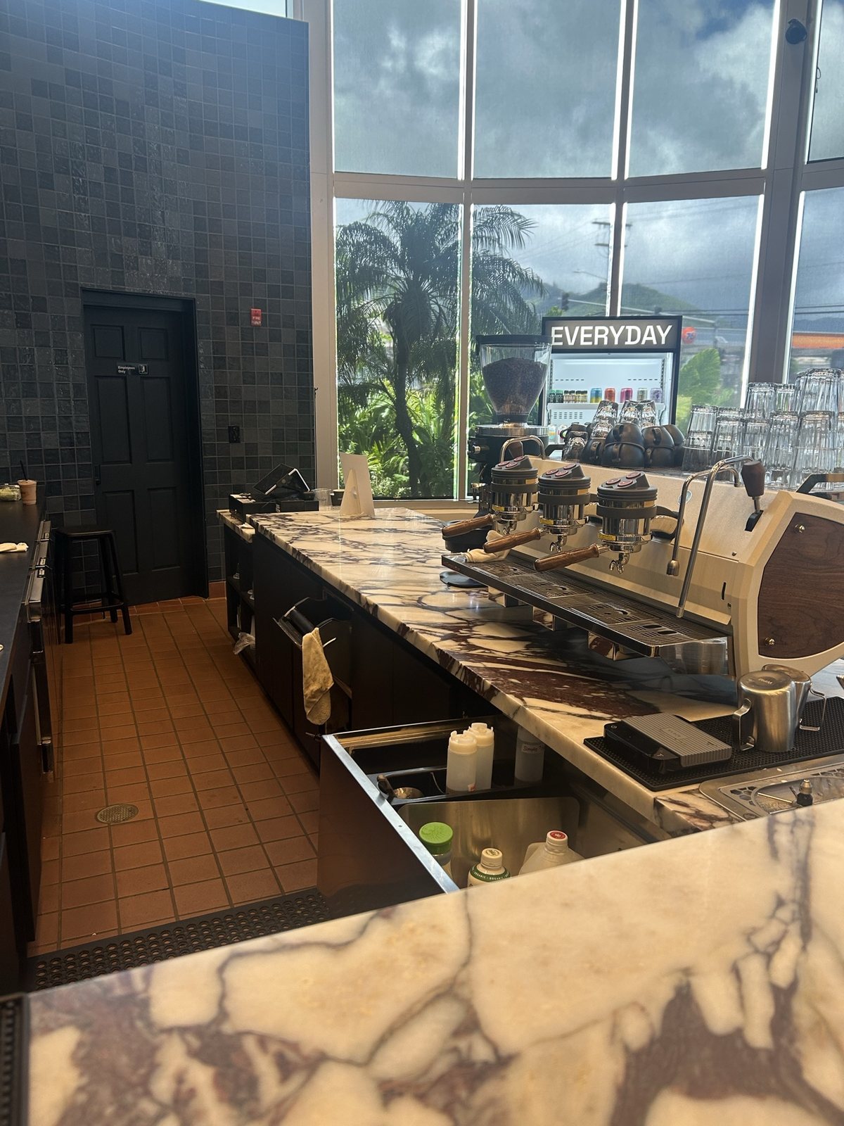 The coffee bar and espresso machine from the side
