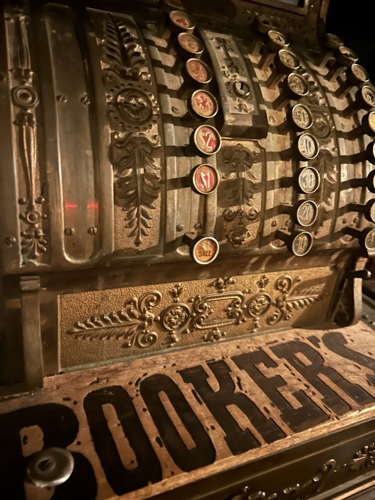 A brass cash register