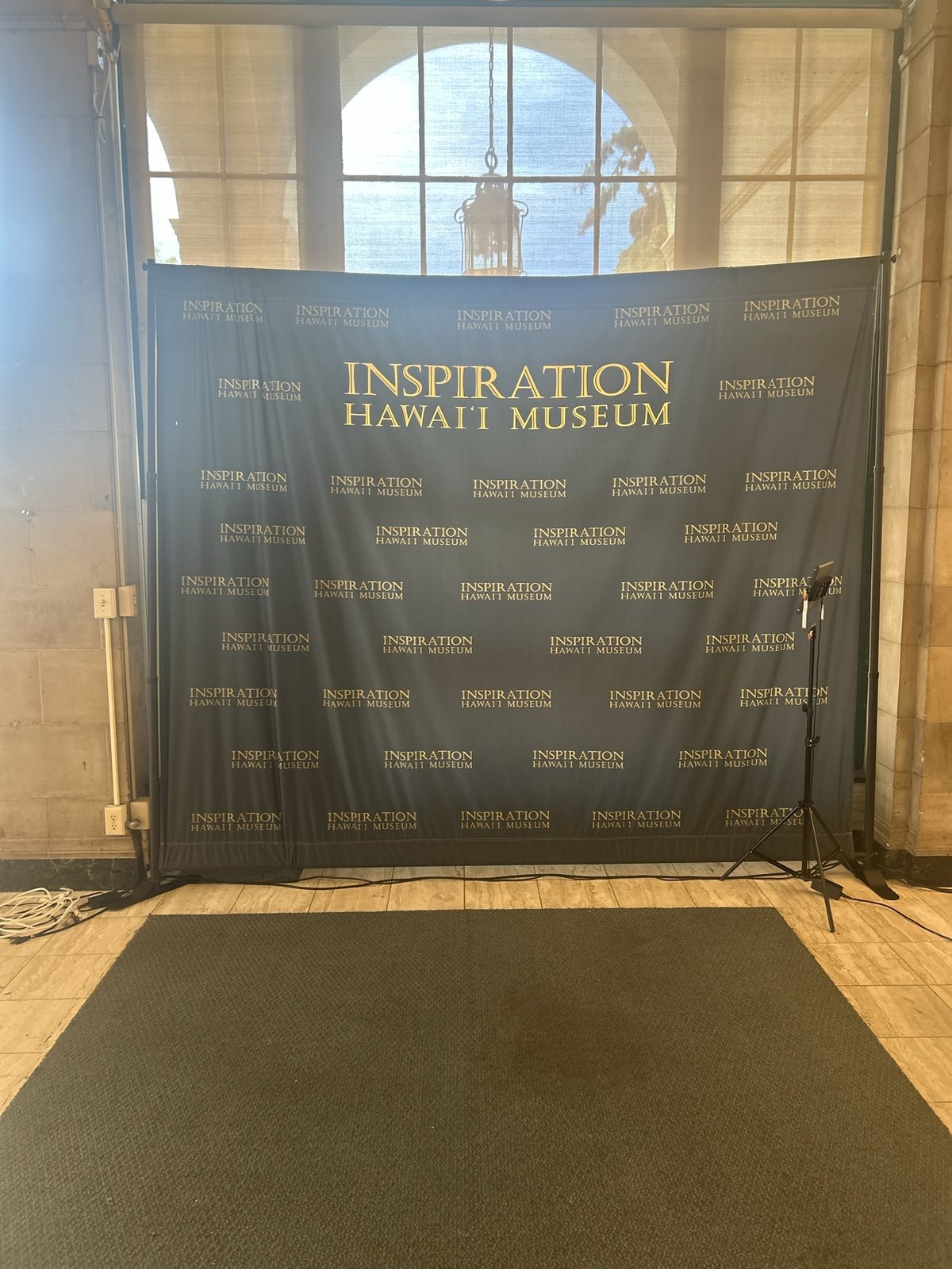 The Inspiration Hawaiʻi Museum step-and-repeat backdrop