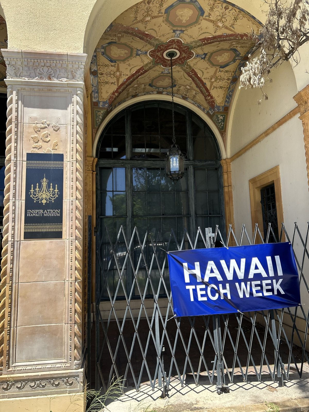 The museum entrance with a Hawaii Tech Week banner