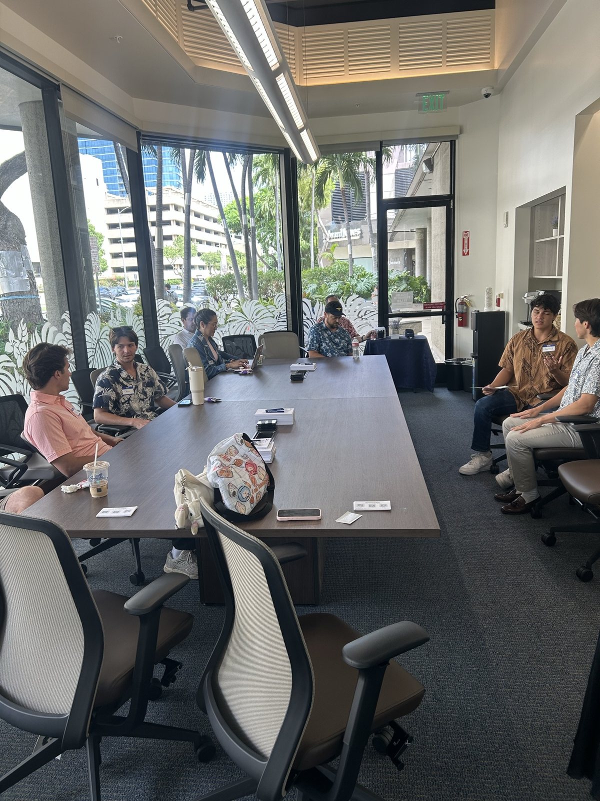 The boardroom with palm trees outside